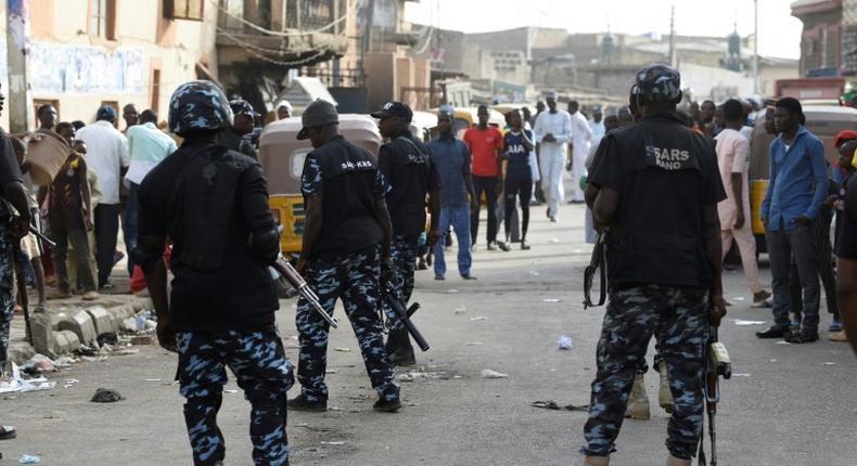 Nigerian Police officers at an operation in Mushin Lagos (PM News)