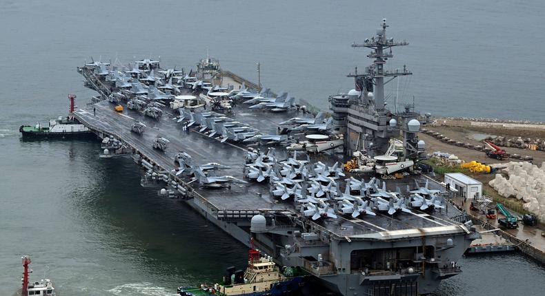 The Theodore Roosevelt, a nuclear-powered aircraft carrier, anchored in Busan, South Korea.Song Kyung-Seok/Pool Photo via AP