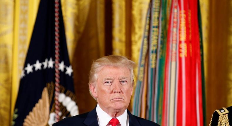 President Trump at a ceremony where he awarded the Medal of Honor to James McCloughan at the White House.