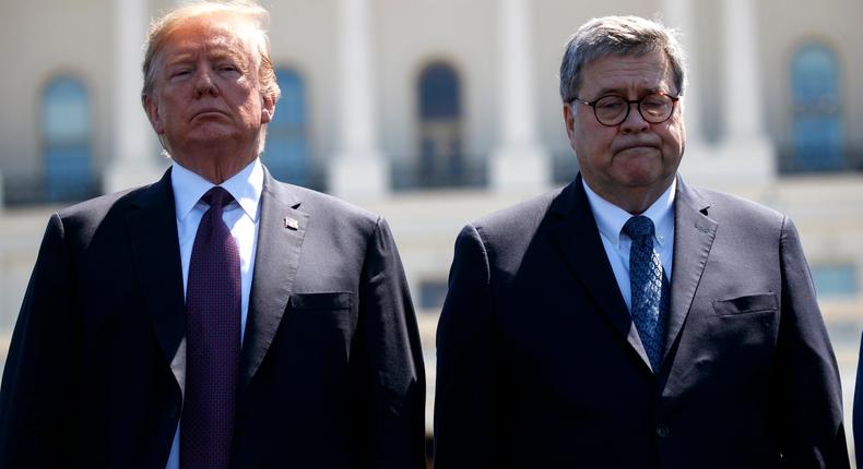 President Donald Trump stands with Attorney General William Barr during the 38th Annual National Peace Officers' Memorial Service at the U.S. Capitol, Wednesday, May 15, 2019, in Washington.
