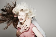 Studio portrait of two women who are best friends