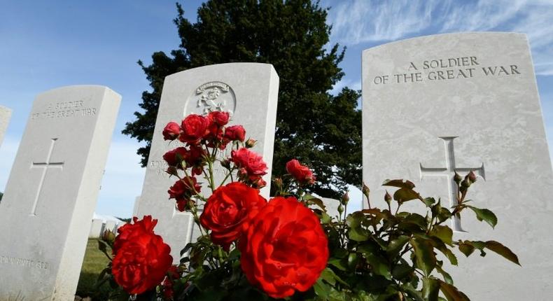 Headstones of soldiers who fell in World War One at The Tyne Cot Commonwealth War Graves Cemetery in Zonnebeke on July 31, 2017, as part of a series of commemorations for the 100th anniversary of the Battle of Passchendaele