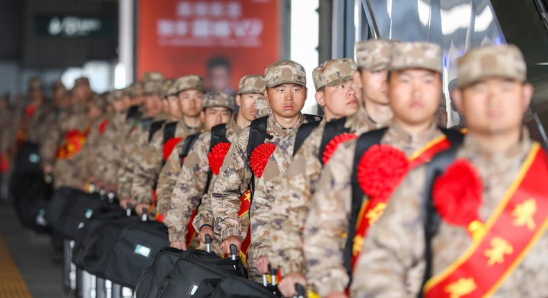 Army recruits who are about to go to military barracks wait at a high-speed railway station in Huai 'an city, Jiangsu province, China, March 19, 2024.CFOTO/Future Publishing via Getty Images