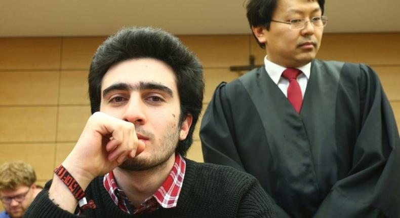 Syrian refugee Anas Modamani (left) and his lawyer Chan-jo Jun, had demanded that Facebook actively search out and take down all slanderous posts using the famous selfie he took with Chancellor Angela Merkel