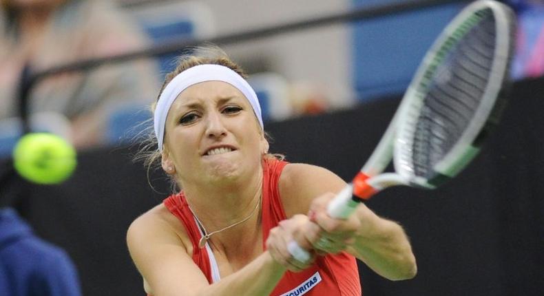 Switzerland's Timea Bacsinszky returns the ball to Belarus' Aryna Sabalenka during the semi-finals of the Fed Cup tennis competition between Belarus and Switzerland in Minsk on April 22, 2017