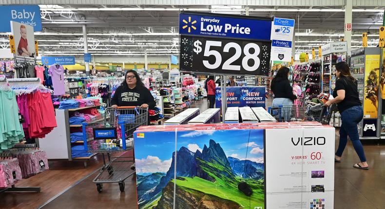 People shop at a Walmart Supercenter store in Rosemead, California in 2019.FREDERIC J. BROWN/AFP via Getty Images