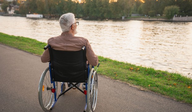 Muškarac u kolicima - ilustracija