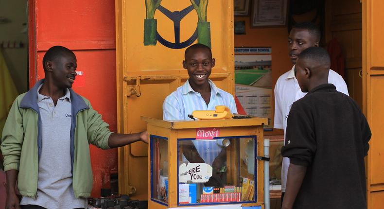 Youth operating a small mobile money business. Luggya has advised the youth to look out for entrepreneurship opportunities. 