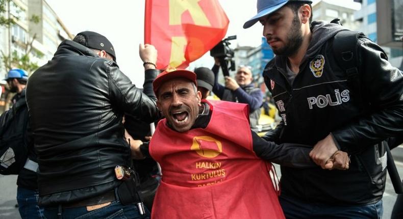 Turkish riot police clash with protesters attempting to defy a May Day ban to march on Taksim Square