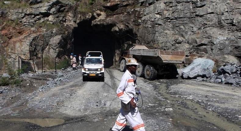 A mine worker is pictured at the Freda Rebecca gold mine in Bindura town February 7, 2015. REUTERS/Philimon Bulawayo