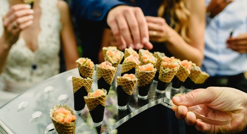 From sushi to tomatoes, these are the biggest wedding food trends of summer 2024.Joaquin Corbalan P/Shutterstock