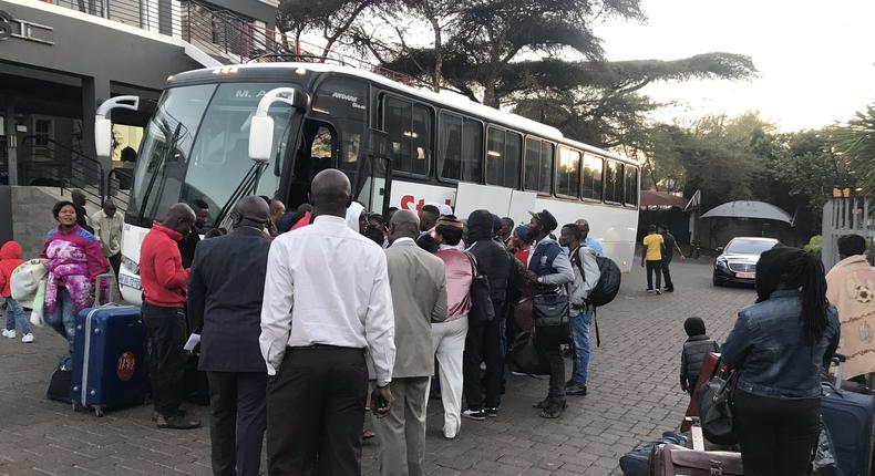 Nigerians board a bus heading to the O.R. Tambo International Airport, near Johannesburg, on their way out of South Africa [Twitter/@HeidiGiokos]