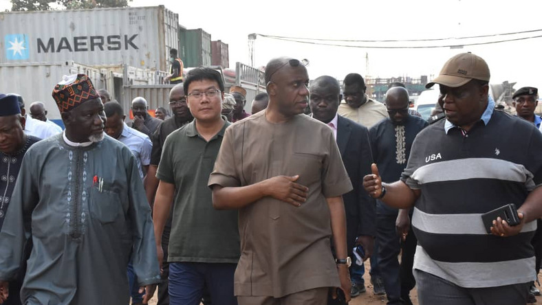 From Left, Chairman Board Of Directors Nigerian Railway Corporation, Malam Ibrahim Al-Hassan Musa, Project Manager, CCECC, Mr Li Depeng, Minister Of Transportation, Rotimi Amaechi And Managing Director Nigerian Railway Corporation,Mr Fidet Okhiria during the inspection Of Lagos-Ibadan Standard Guage Rail in Lagos on Saturday (NAN)