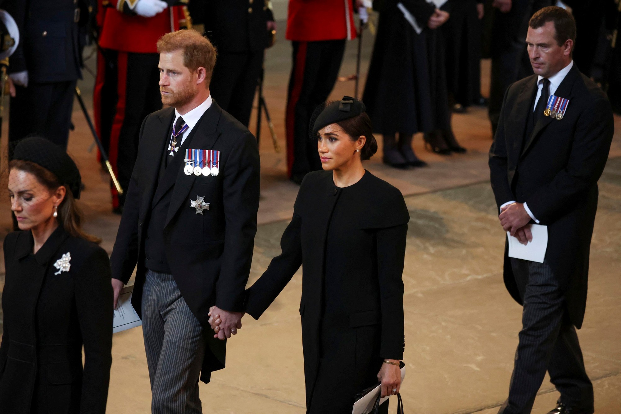 Britský princ Harry s manželkou a princeznou Kate a princom Williamom.