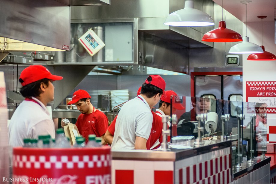 If you want, you can watch your entire burger be cooked and prepared from the grill to the bag in the open kitchen.