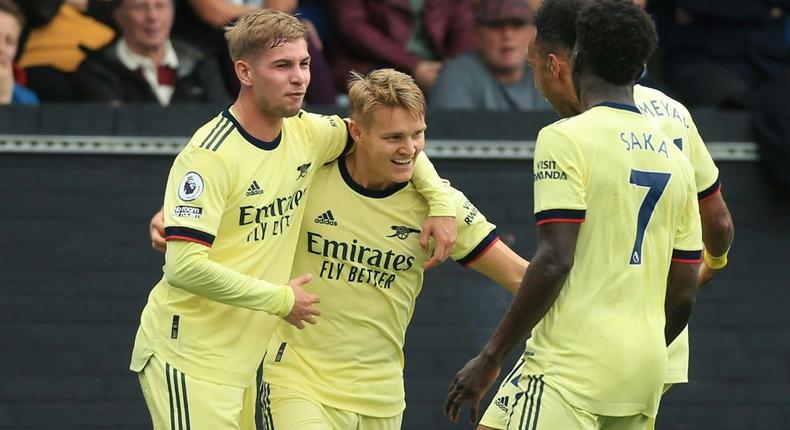 Martin Odegaard (centre) celebrates after scoring for Arsenal against Burnley Creator: Lindsey Parnaby