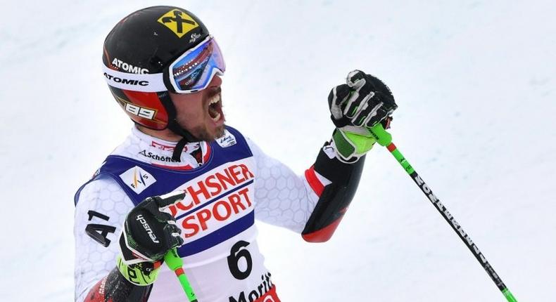 Austria's Marcel Hirscher shows his delight in the finish area after the second run of the men's giant slalom race at the 2017 FIS Alpine World Ski Championships in St Moritz on February 17, 2017