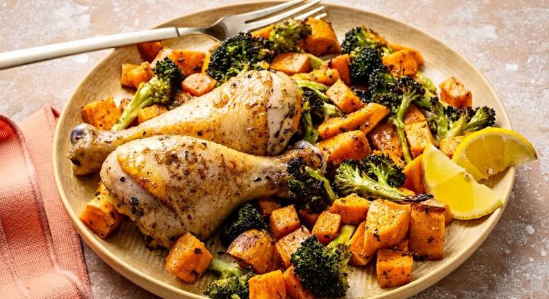 Adding sweet potato to a meal of chicken drumsticks and broccoli makes it a more balanced plate.The Washington Post/Getty Images