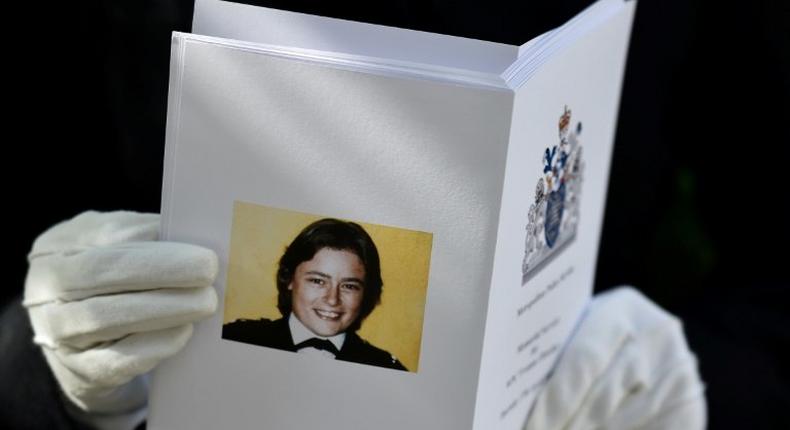 A policewoman holds an order of service ahead of a remembrance service to mark the 30th anniversary of the killing of British police officer Yvonne Fletcher (pictured) on April 17, 2014