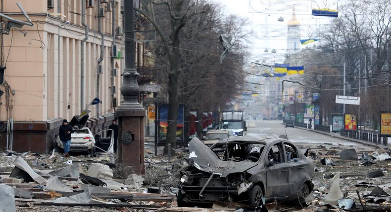 A burnt-out car is seen on the street after a missile launched by Russian invaders hit near the Kharkiv Regional State Administration building in Svobody (Freedom) Square) at approximately 8 am local time on Tuesday, March 1, Kharkiv, northeastern Ukraine, on March 1, 2022, in Kharkiv, Ukraine.