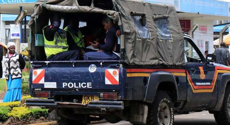 File image of a police vehicle ferrying suspects