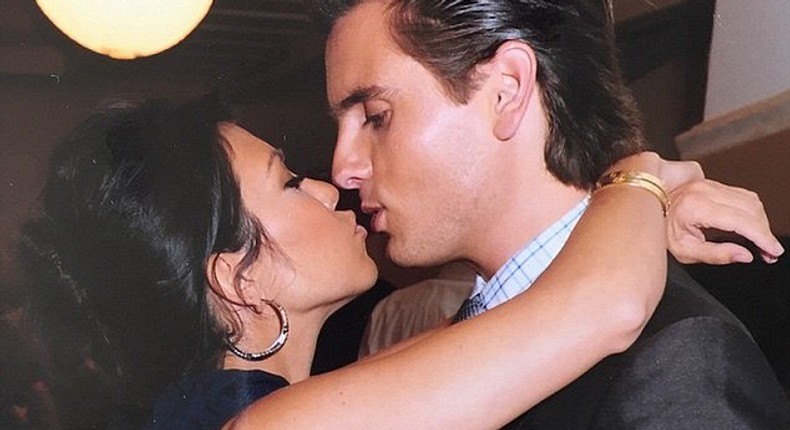 Kourtney Kardashian kisses Scott Disick