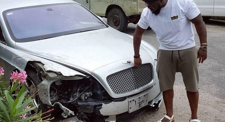 Timaya with his bashed Bentley 