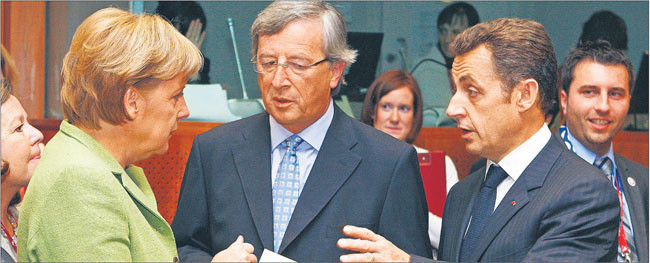 W specjalnej grupie uczestniczyli przedstawiciele Niemiec, Francji i otoczenia luksemburskiego premiera Jeana-Claude’a Junckera (w środku) Fot. Reuters/Forum