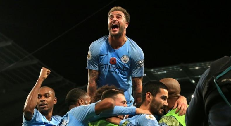 Manchester City moved back to the top of the Premier League with a 3-1 win over Manchester United