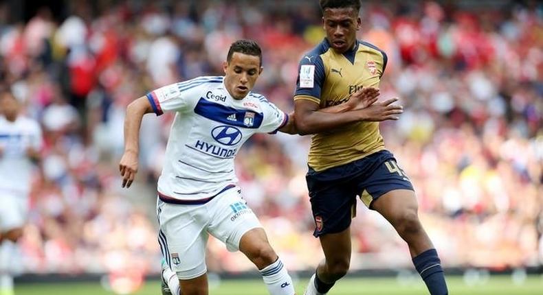 Lyon's Mehdi Zeffane in action with Arsenal's Alex Iwobi Reuters / Paul Hackett Livepic