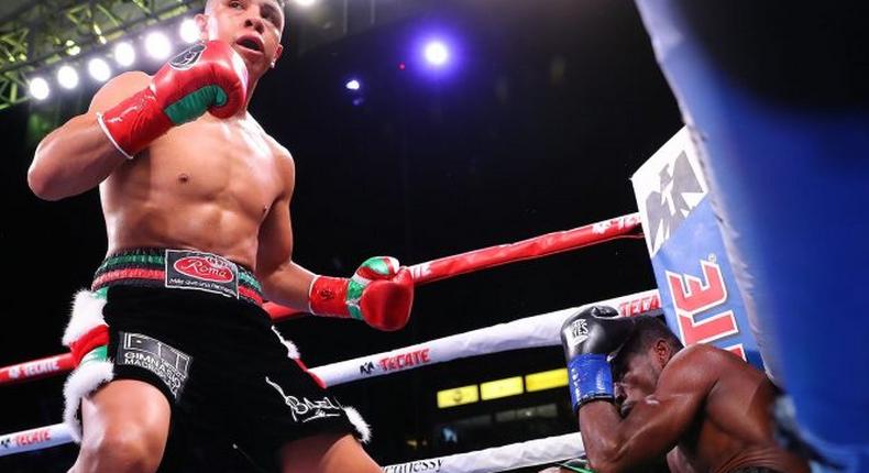 Jaime Munguia floors Patrick Allotey