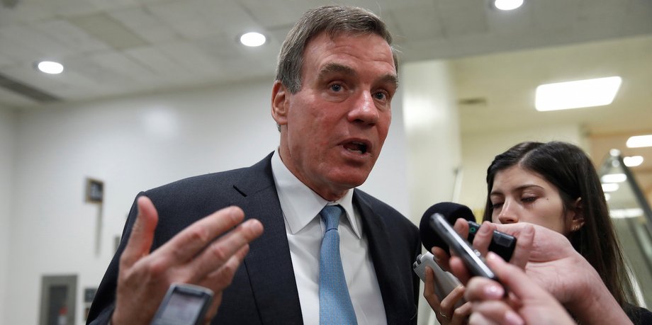 Sen. Mark Warner (D-VA) speaks with reporters about the Senate healthcare bill on Capitol Hill in Washington, D.C., U.S., June 27, 2017.