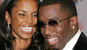 Kim Porter and Sean Diddy Combs in 2003Getty Images/Giulio Marcocchi