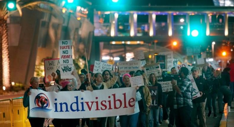 Protesters rally against the travel ban at San Diego International Airport in California on March 6, 2017, after US President Donald Trump signed a revised ban on refugees and travelers from six Muslim-majority nations