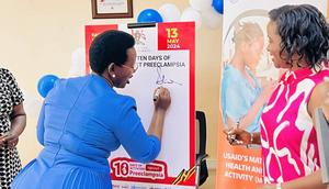 PS Diana Atwiine and Mrs Anne Juuko from the Corporate Society for Safe Motherhood launching the campaign