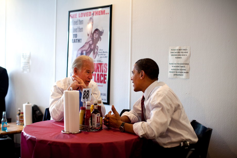 Obama and Biden wait for their lunch during an unannounced visit to Ray's Hell Burger in Arlington.
