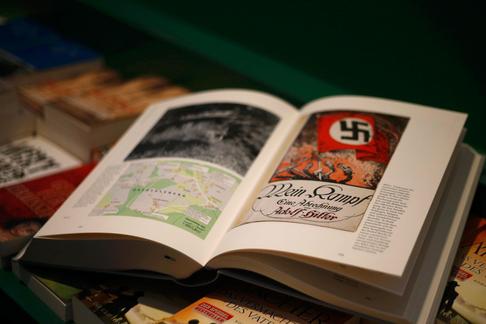 A copy of the book 'Hitler, Mein Kampf. A Critical Edition' lies on a display table in a bookshop in