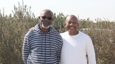 Dennis Hutson (right) co-bought the land for TAC farm with his sister and brother-in-law Kayode Kadara (left).Jo Ann Baumgartner