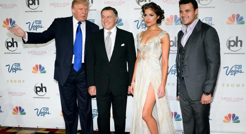 Donald Trump meeting Azerbaijani-Russian businessman Aras Agalarov, his son Emin Agalarov and Miss Universe 2012 Olivia Culpo at the 2013 Miss USA pageant