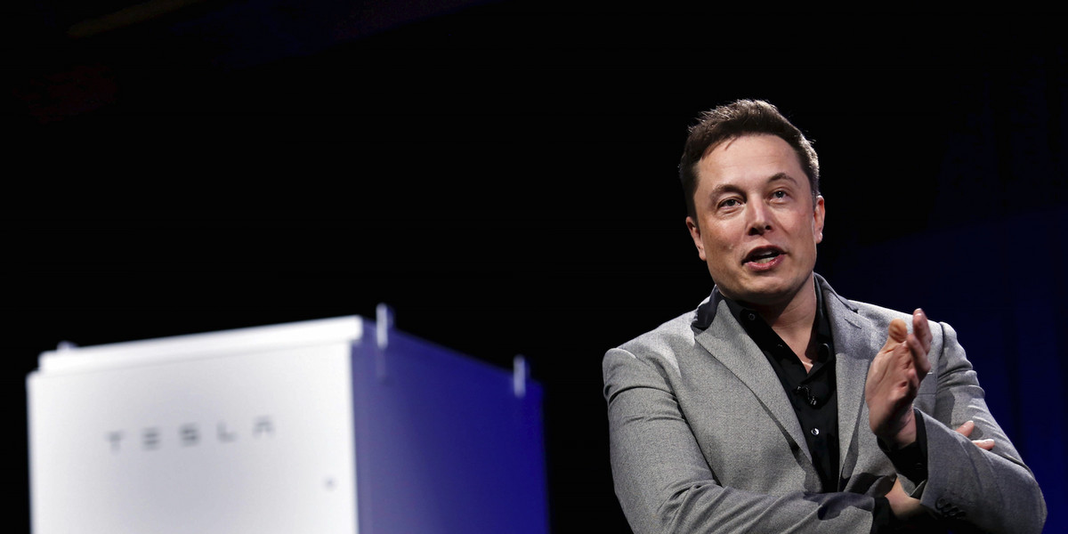Musk with a Tesla Energy battery.