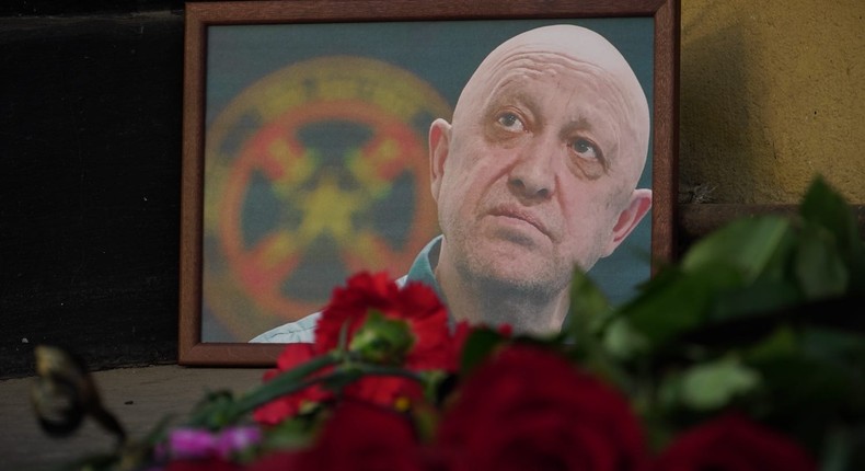 People lay carnations to a memorial as they pay tribute to Yevgeny Prigozhin in Rostov-on-Don, Russia, on August 24, 2023.Vladimir Alexandrov/Anadolu Agency via Getty Images