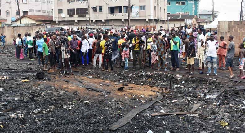 Crowd at the site of the Fire incident at Okobaba Ebute by Jeba, Lagos Mainland Local Government, during the visit of the Representatives of  Lagos Governor, Babajide Sanwo-Olu on Sunday (NAN)