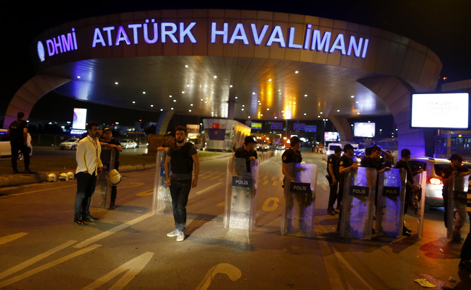 Police guard the entrance to Turkey's largest airport, Istanbul Ataturk, after a blast on June 28.