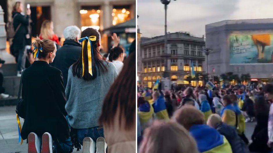 Ukraińcy klęczący przed katedrą  Mediolanie