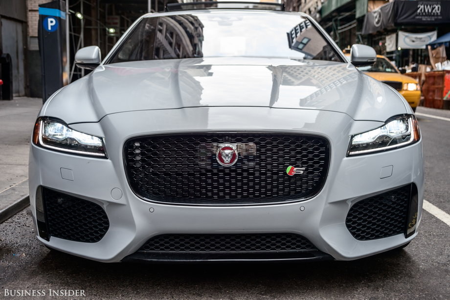 Up front, the XF sports Jaguar's new headlight and grille design is also found on the ...
