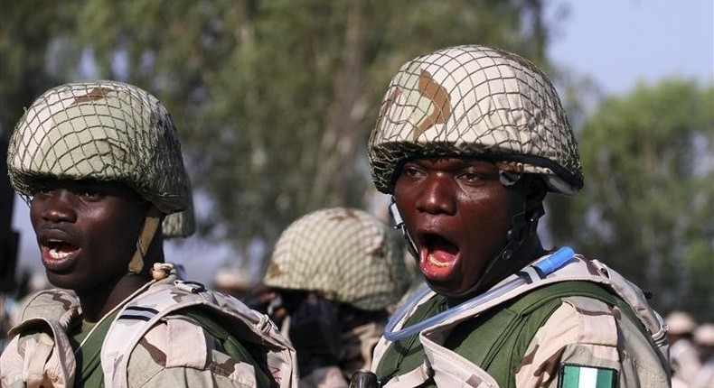 Nigerian soldiers gather during preparations for their deployment to Mali, at the army's peacekeeping centre in Nigeria's northern state of Kaduna January 17, 2013. 