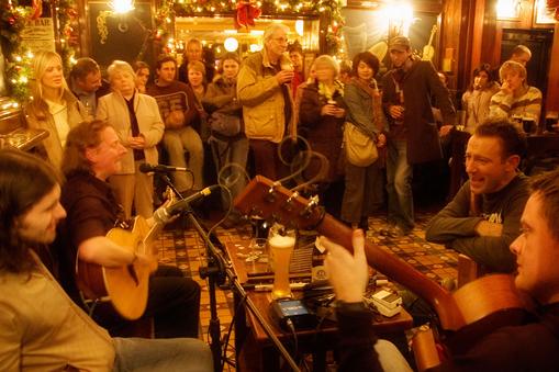 Musicians playing live in a Dublin pub