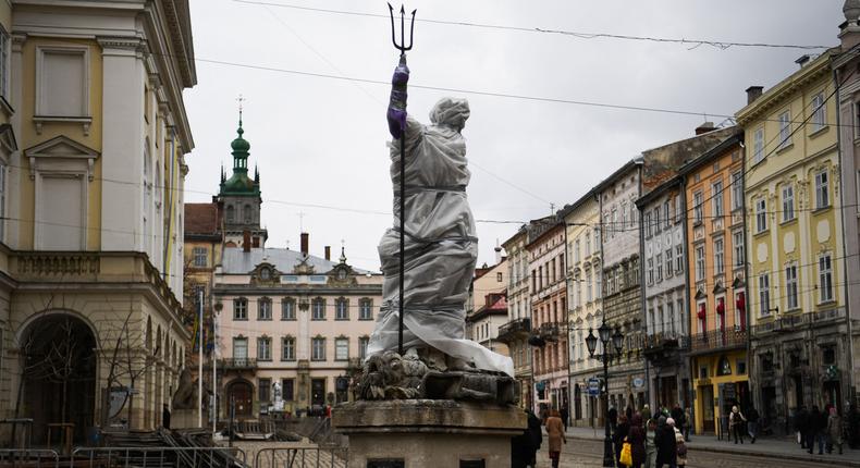 A statue outside the Latin Cathedral in Lviv, western Ukraine, is wrapped up to protect it from potential damage.