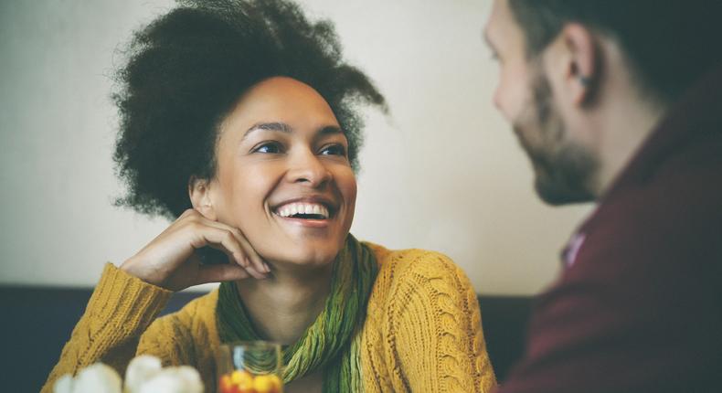 Happy woman on a date [Credit everyday feminism]