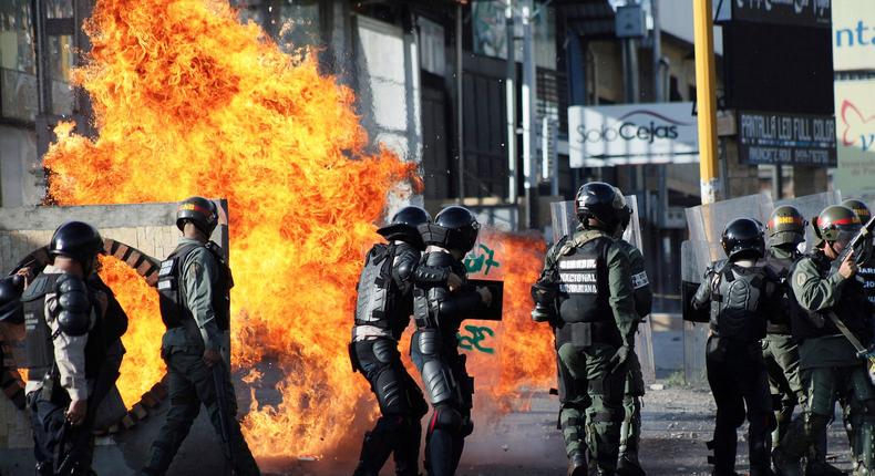 Security forces clashing with demonstrators during a protest against Venezuelan President Nicolas Maduro's government in Tariba, Venezuela.